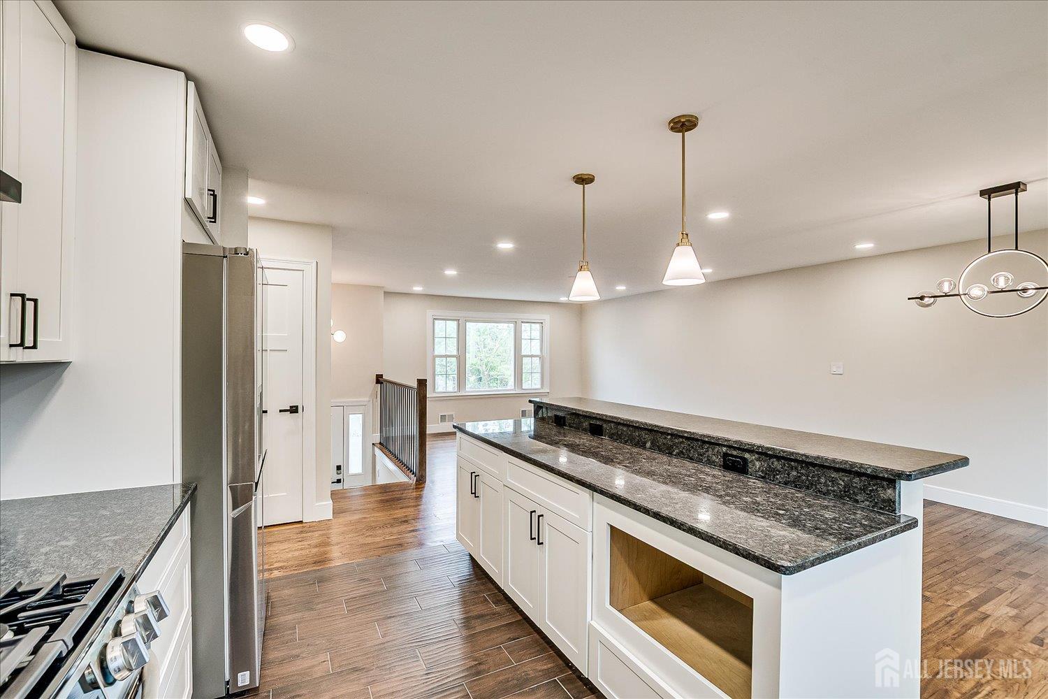 3 Birch Road Edison, NJ 08817 - Photo 15 of 33 a kitchen with stainless steel appliances granite countertop a stove and a sink