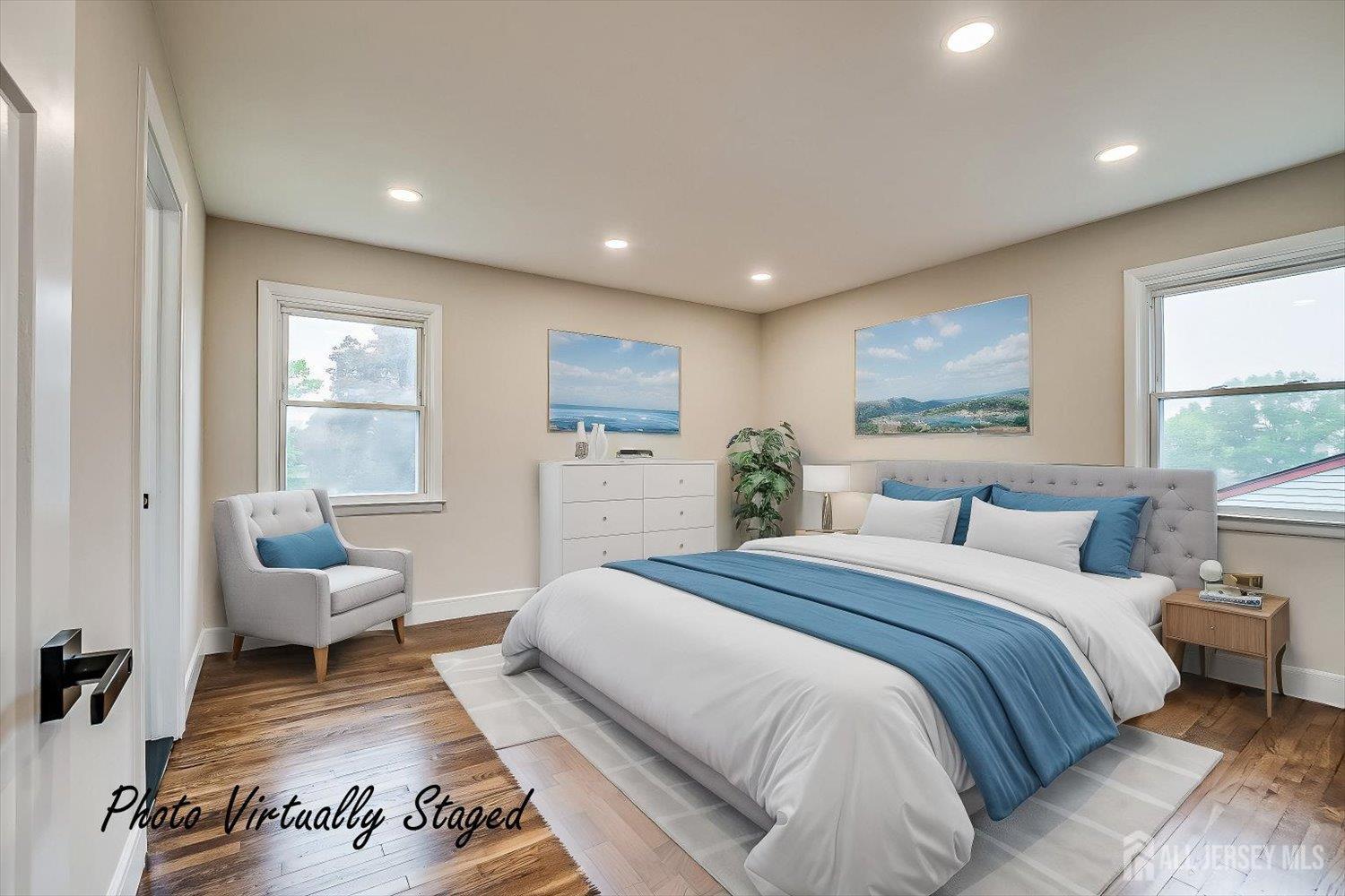 3 Birch Road Edison, NJ 08817 - Photo 16 of 33 a spacious bedroom with a large bed a couch and two window