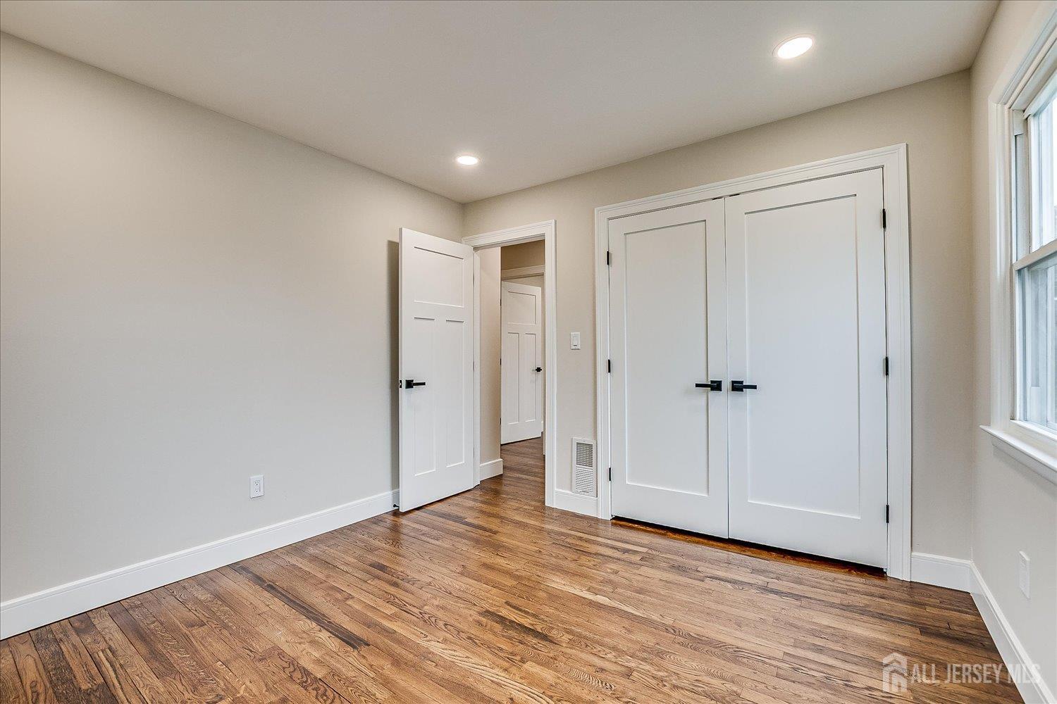 3 Birch Road Edison, NJ 08817 - Photo 20 of 33 a view of empty room with wooden floor