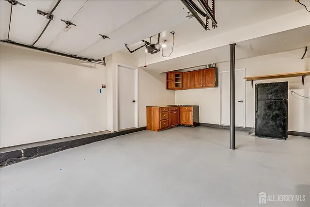 a view of an empty room with closet