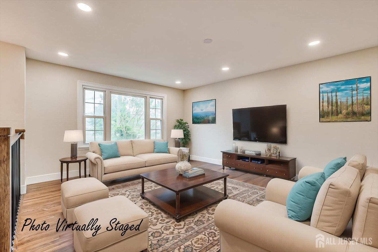 3 Birch Road Edison, NJ 08817 - Photo 3 of 33 a living room with furniture and a flat screen tv