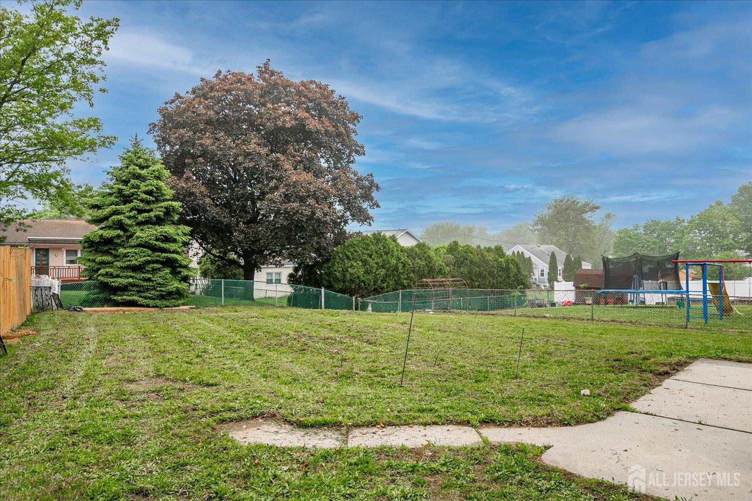 3 Birch Road Edison, NJ 08817 - Photo 33 of 33 a view of a field with a tree