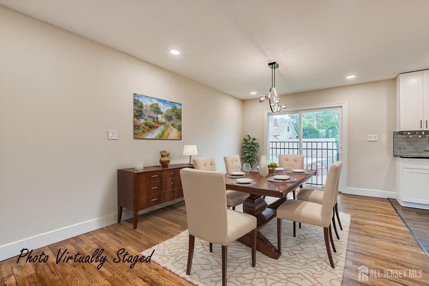 3 Birch Road Edison, NJ 08817 - Photo 8 of 33 a view of a dining room with furniture window and wooden floor