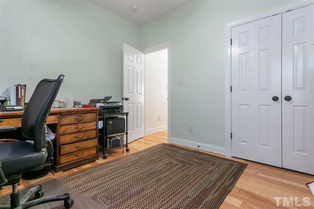 100 North Sunset Ridge Drive Willow Spring, NC 27592 - Photo 18 of 25 a view of a workspace with furniture and wooden floor