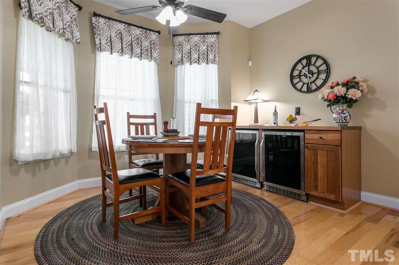 100 North Sunset Ridge Drive Willow Spring, NC 27592 - Photo 9 of 25 a view of a dining room with furniture window and wooden floor