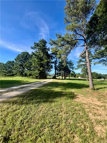a view of a lake with a big yard