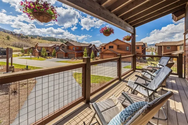 a view of a balcony with chairs