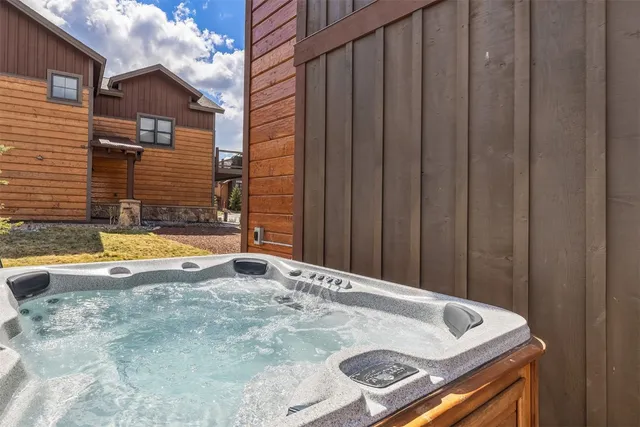 a view of bath tub sitting in middle of a house