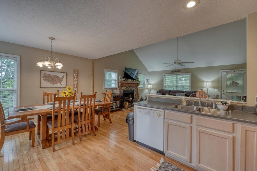 2532 Hunter Road Hiawassee, GA 30546 - Photo 16 of 54 a kitchen with lots of counter top space and dining table
