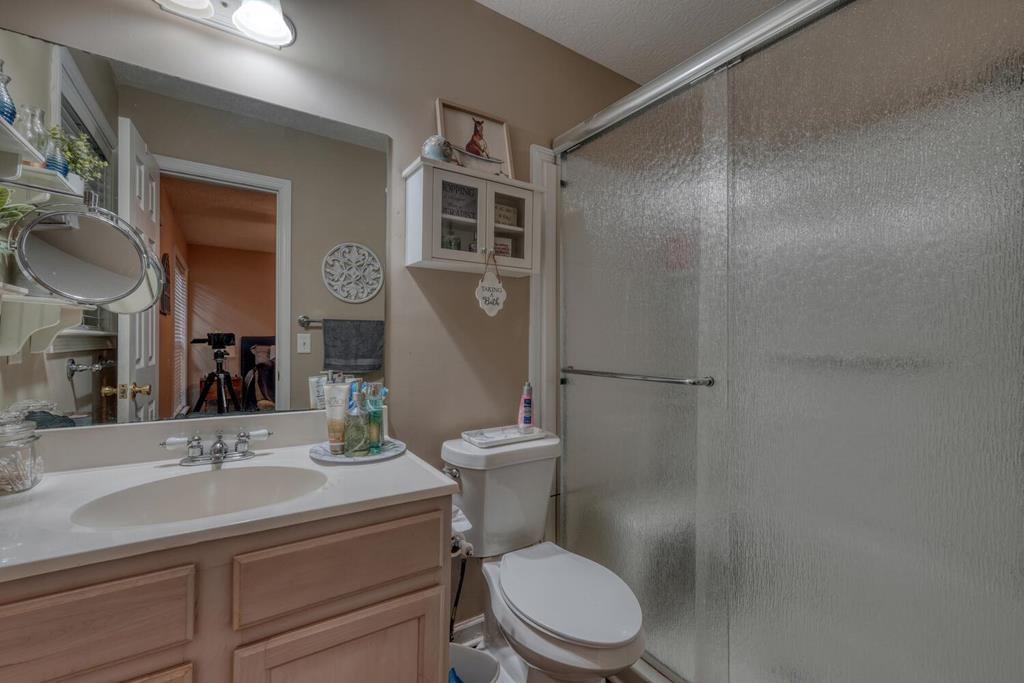 2532 Hunter Road Hiawassee, GA 30546 - Photo 21 of 54 a bathroom with a sink toilet and shower