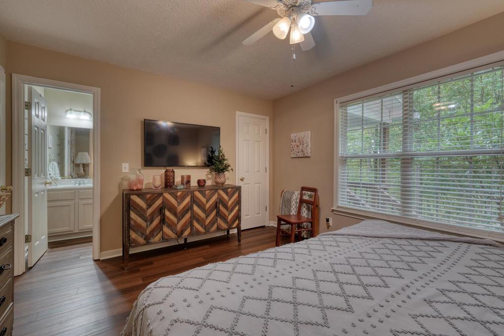 2532 Hunter Road Hiawassee, GA 30546 - Photo 24 of 54 a bedroom with furniture and flat screen tv
