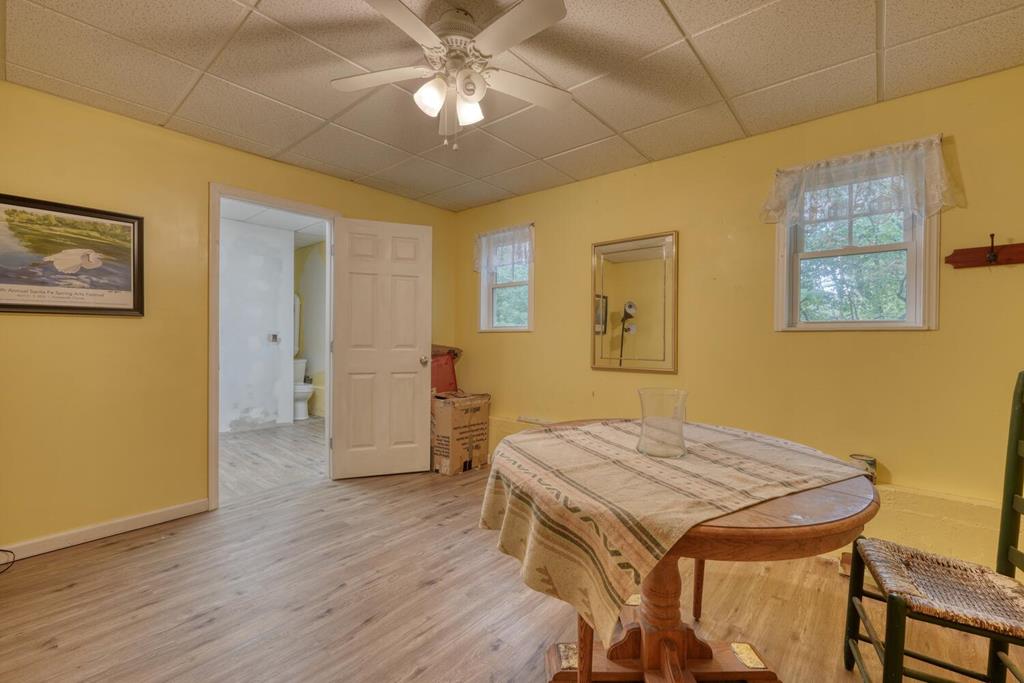 2532 Hunter Road Hiawassee, GA 30546 - Photo 30 of 54 a dining room with a table and chairs