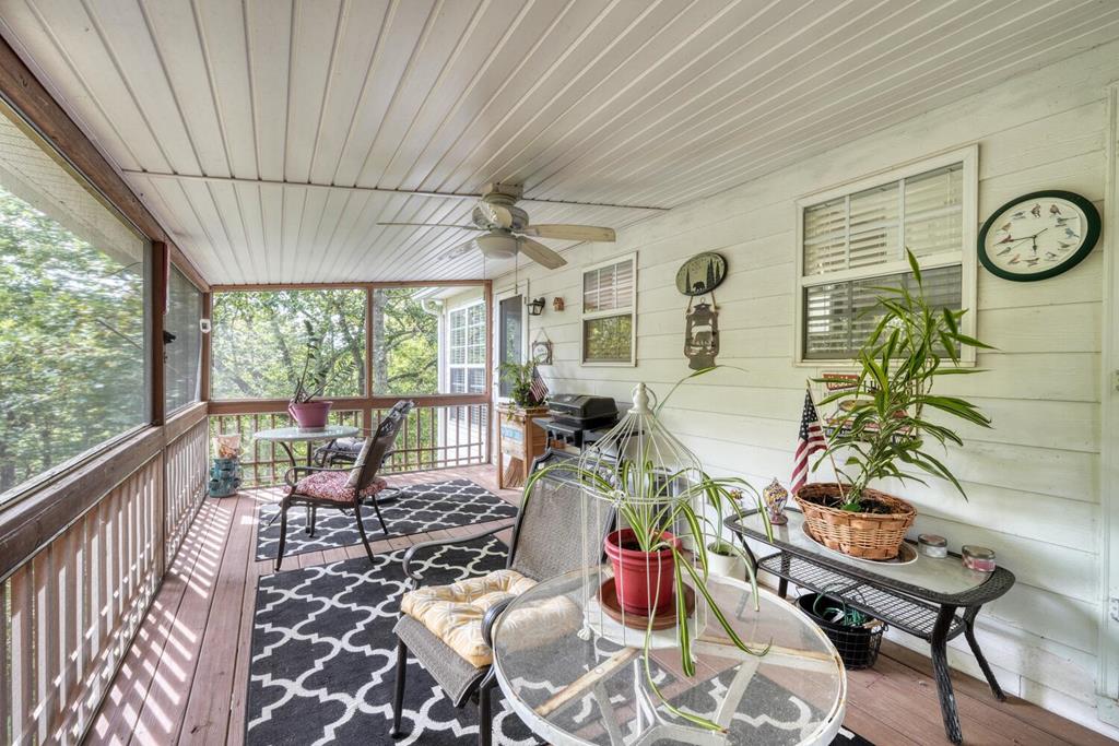 2532 Hunter Road Hiawassee, GA 30546 - Photo 35 of 54 a living room with furniture and wooden floor