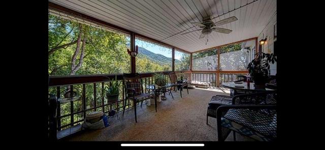 2532 Hunter Road Hiawassee, GA 30546 - Photo 40 of 54 a view of a dining room with furniture window and outside view