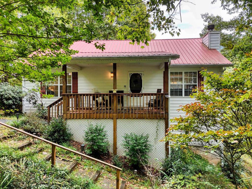 2532 Hunter Road Hiawassee, GA 30546 - Photo 5 of 54 a view of a house with wooden deck
