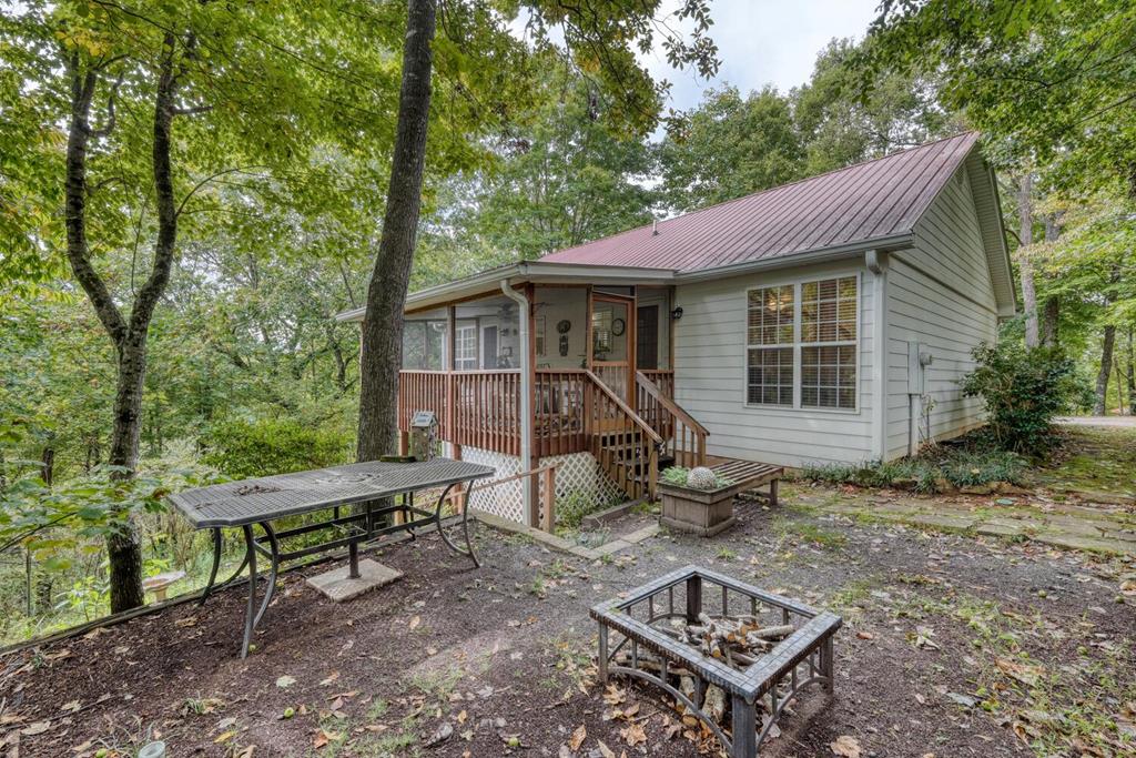 2532 Hunter Road Hiawassee, GA 30546 - Photo 6 of 54 a view of a small house with backyard