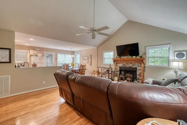 a view of a living room filled with furniture