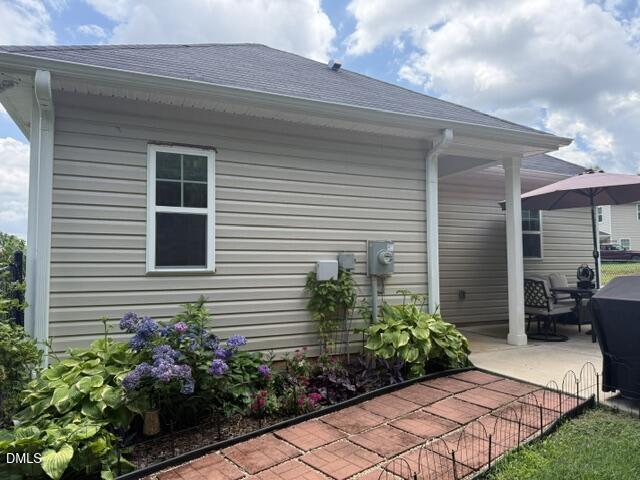 574 East Ridge Avenue Liberty, NC 27298 - Photo 5 of 28 a house with a yard