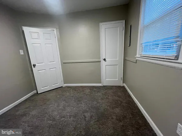an empty room with closet