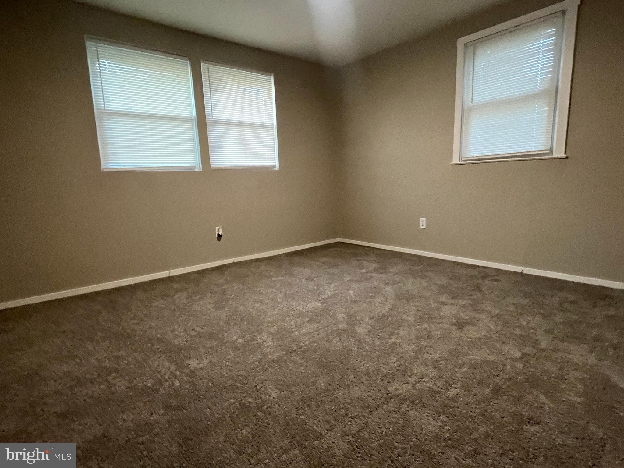 219 Kinsley Road Pemberton, NJ 08068 - Photo 10 of 22 an empty room with a window