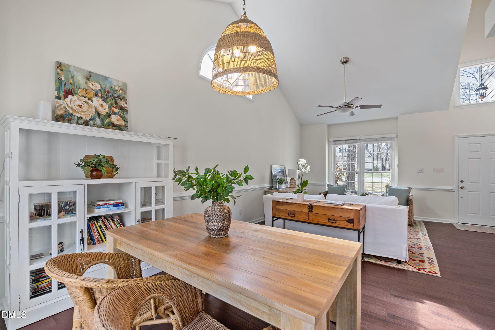 5512 Banwell Place Raleigh, NC 27613 - Photo 10 of 47 a dining room with furniture potted plants and wooden floor