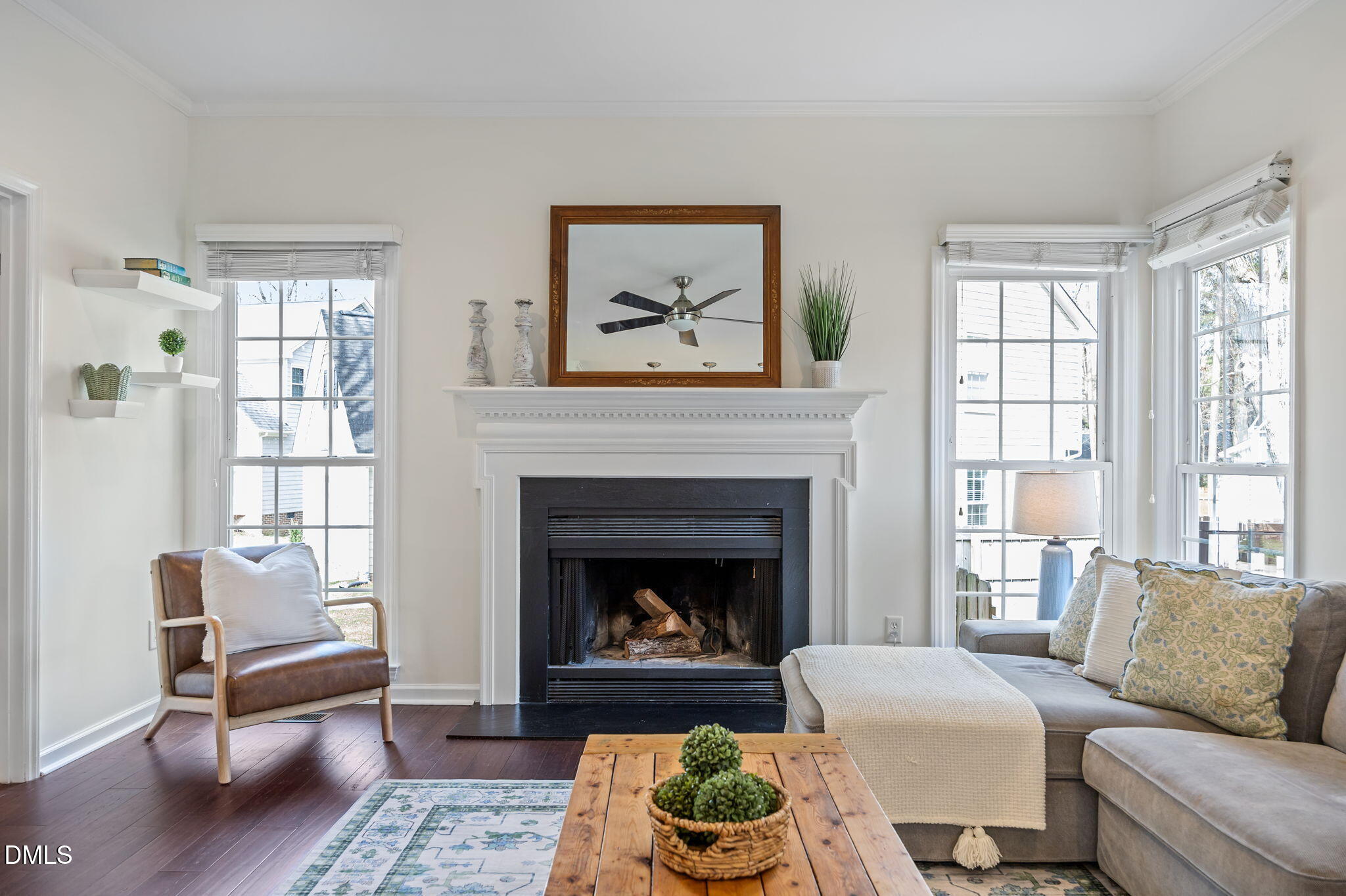 5512 Banwell Place Raleigh, NC 27613 - Photo 17 of 47 a living room with furniture and a fireplace