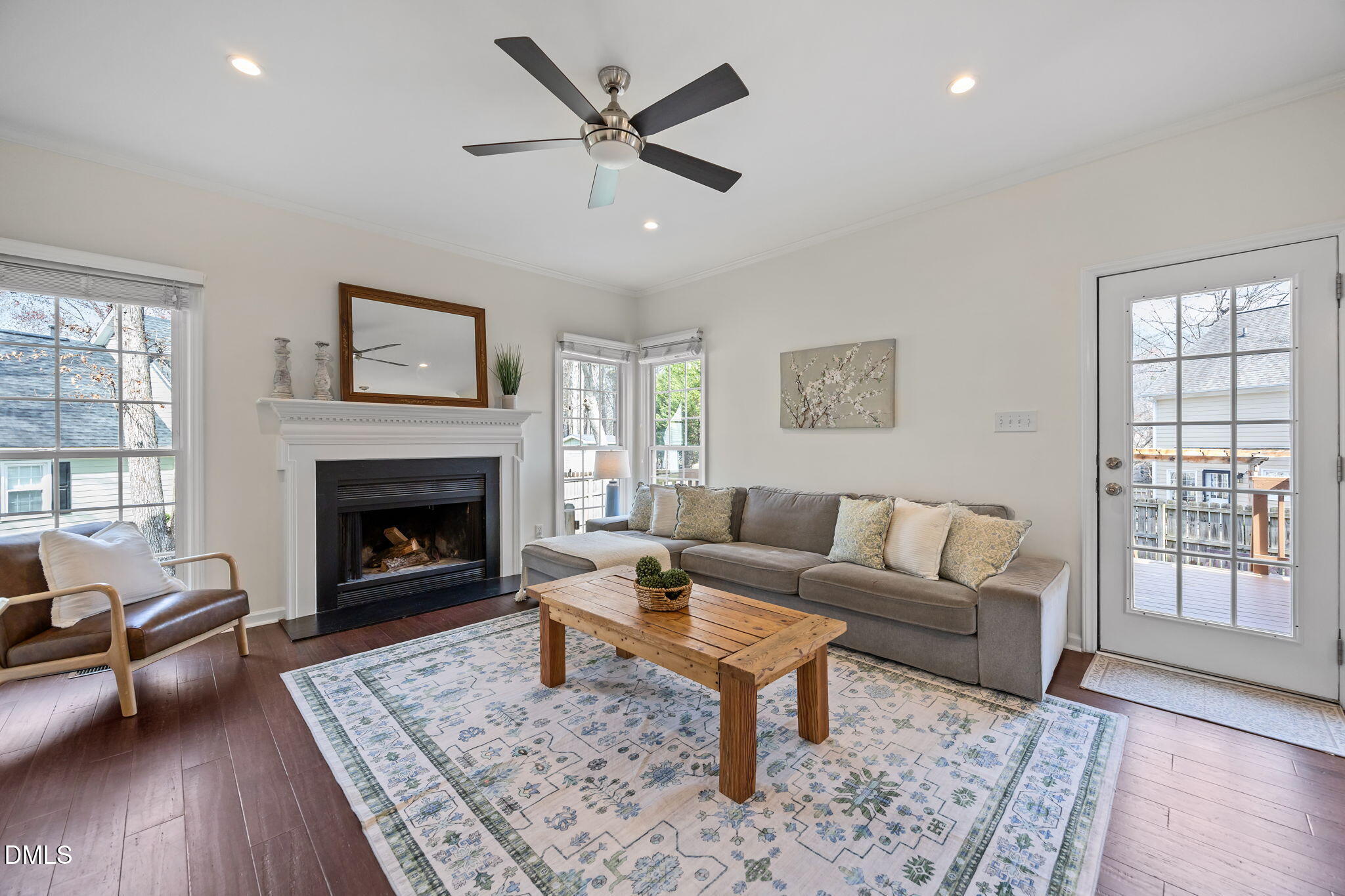 5512 Banwell Place Raleigh, NC 27613 - Photo 18 of 47 a living room with furniture and a fireplace