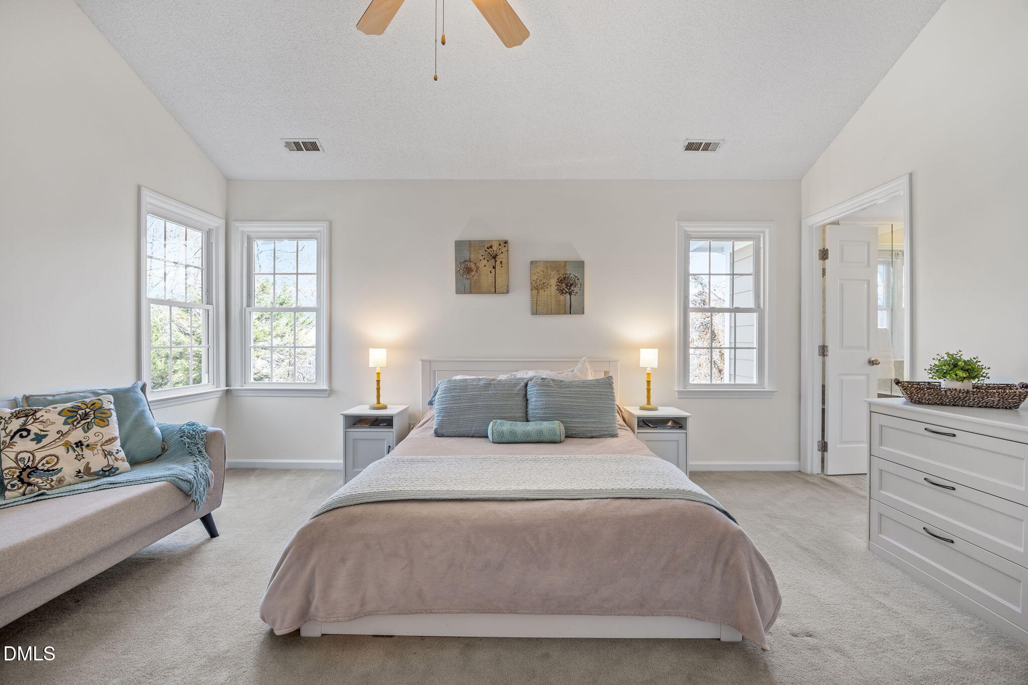 5512 Banwell Place Raleigh, NC 27613 - Photo 22 of 47 a bedroom with a bed and window