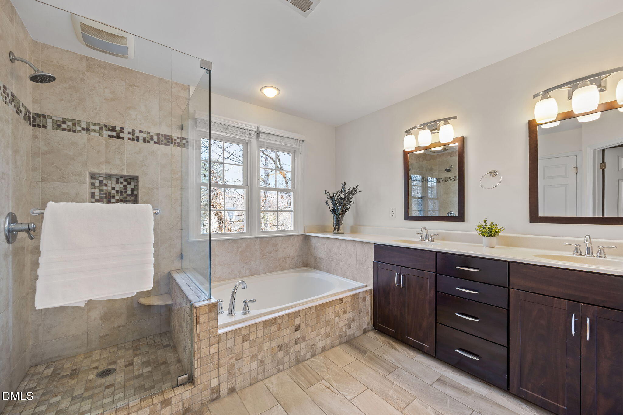 5512 Banwell Place Raleigh, NC 27613 - Photo 25 of 47 a spacious bathroom with a tub sink and mirror