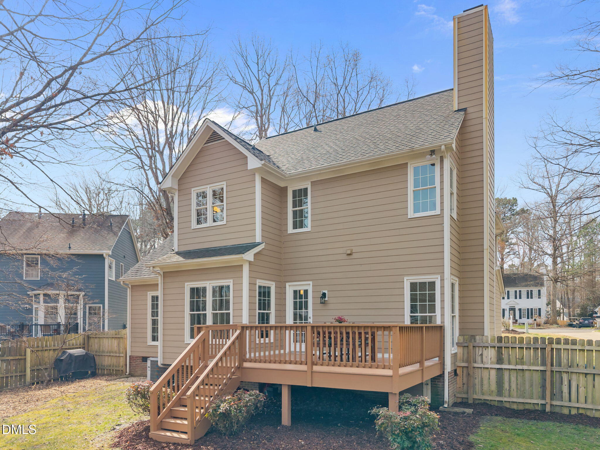 5512 Banwell Place Raleigh, NC 27613 - Photo 33 of 47 a view of a house with backyard and porch