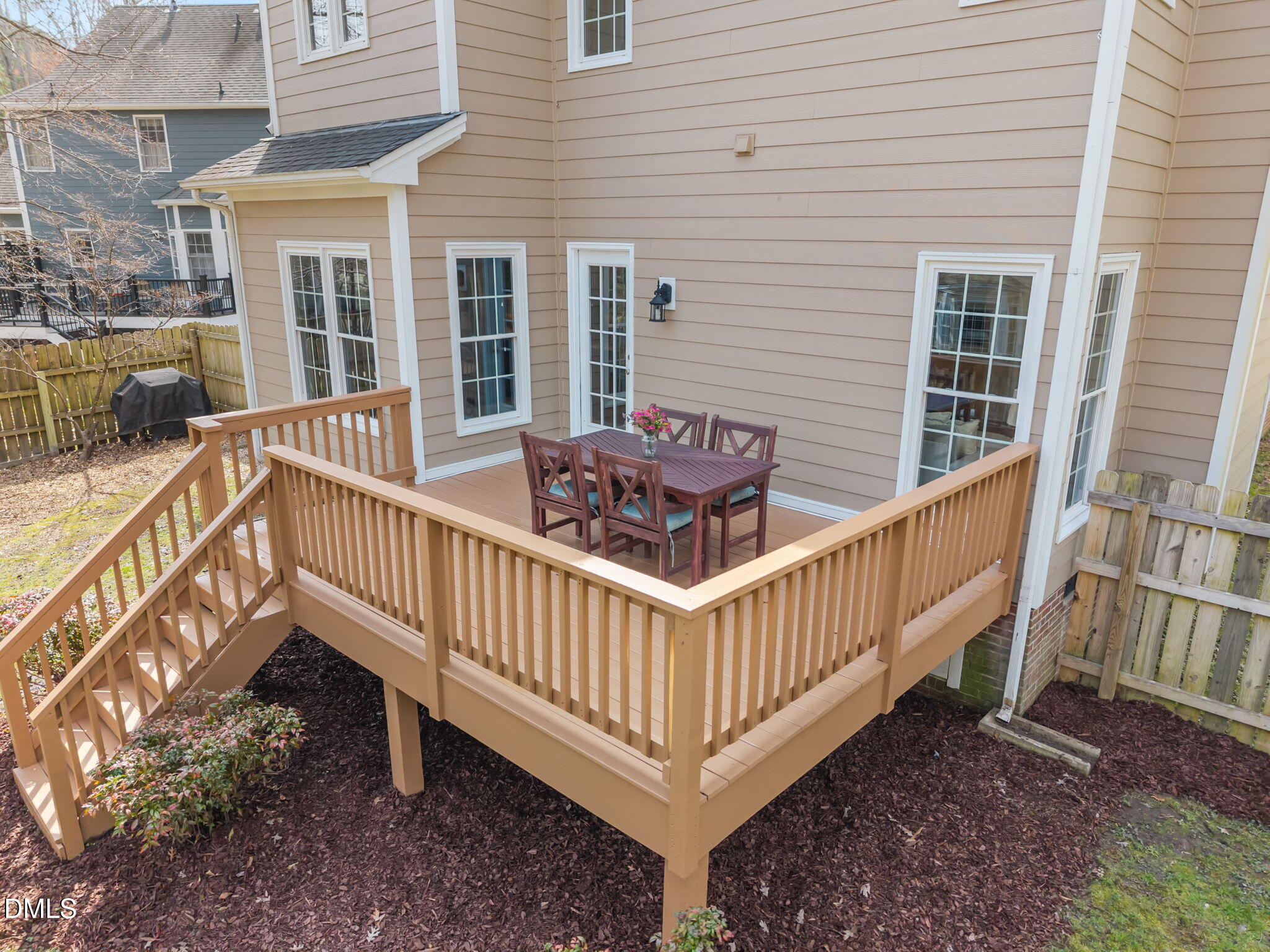 5512 Banwell Place Raleigh, NC 27613 - Photo 34 of 47 a view of a house with wooden deck