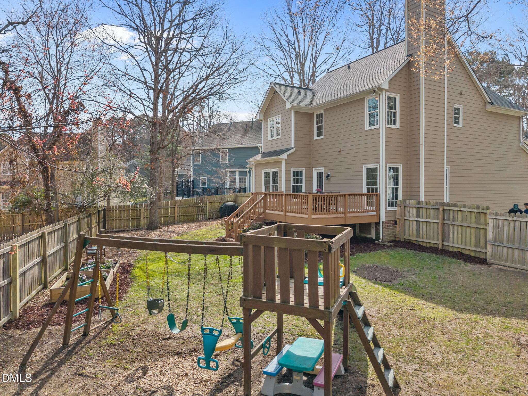 5512 Banwell Place Raleigh, NC 27613 - Photo 39 of 47 a patio with table and chairs and potted plants