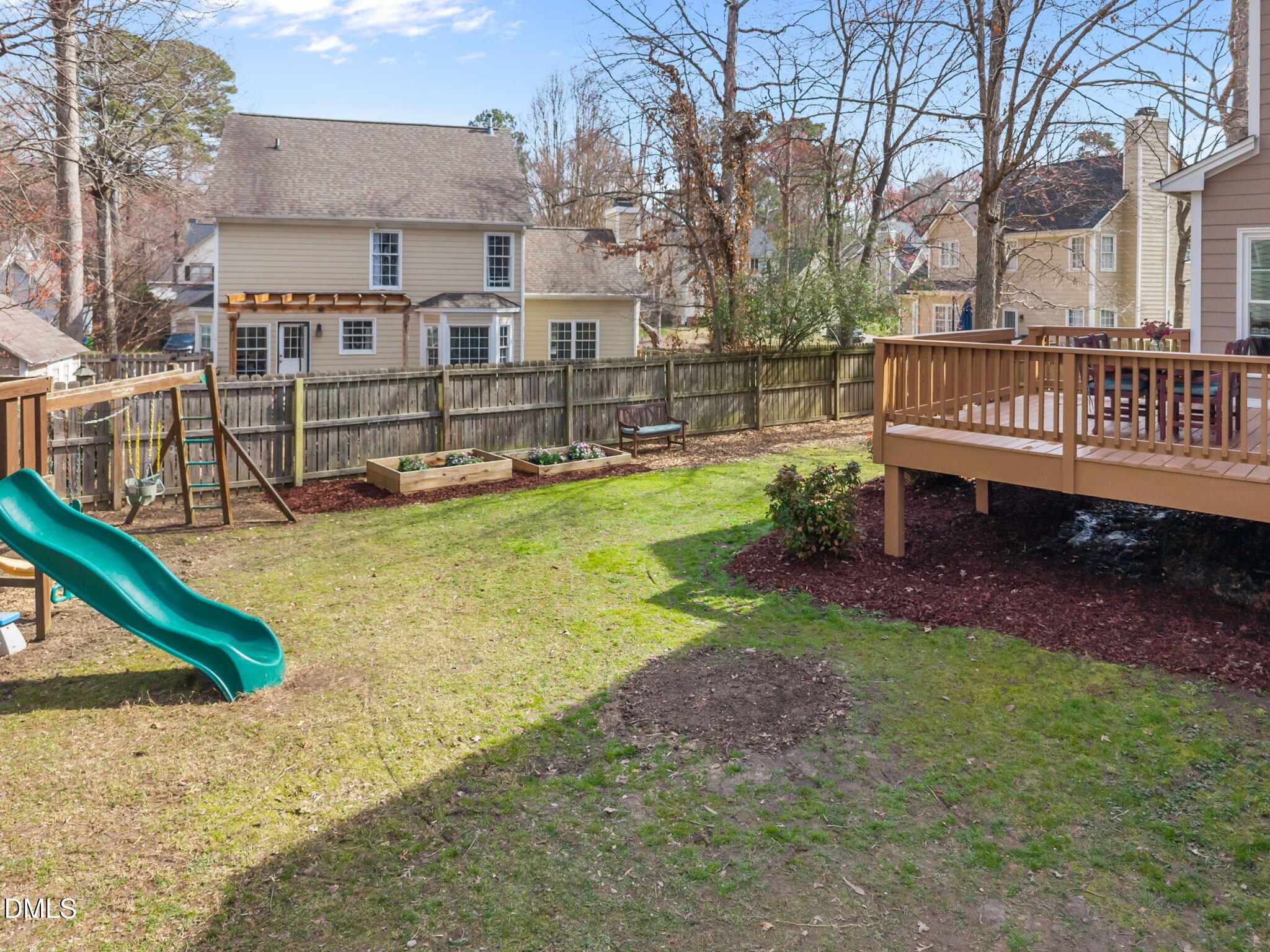 5512 Banwell Place Raleigh, NC 27613 - Photo 40 of 47 a view of a house with backyard and sitting area