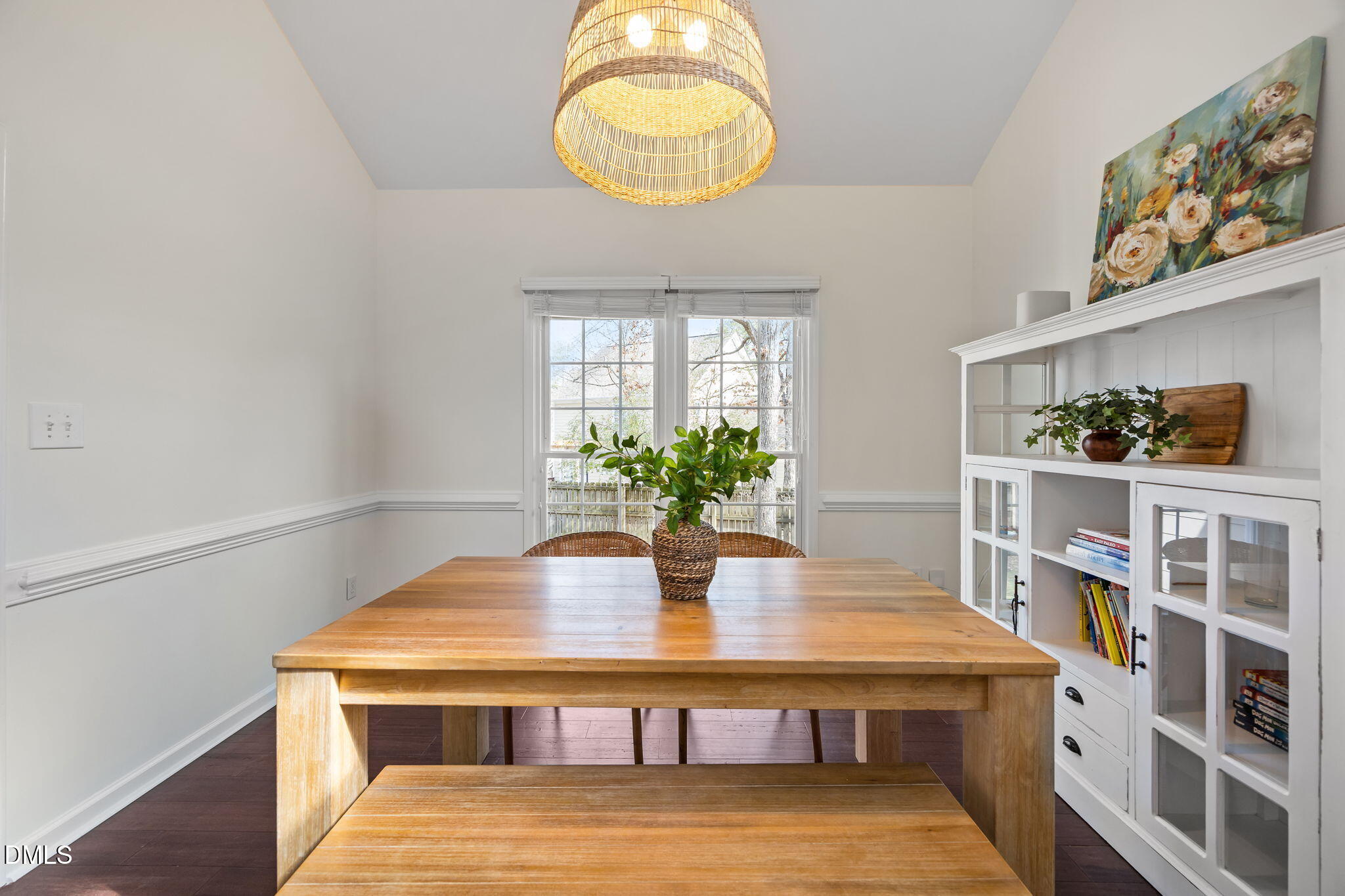 5512 Banwell Place Raleigh, NC 27613 - Photo 8 of 47 a view of a dining room with furniture and a potted plant