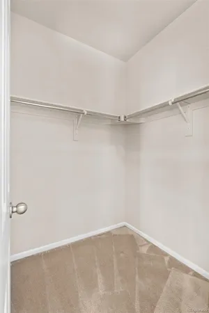 a view of an empty walk in closet