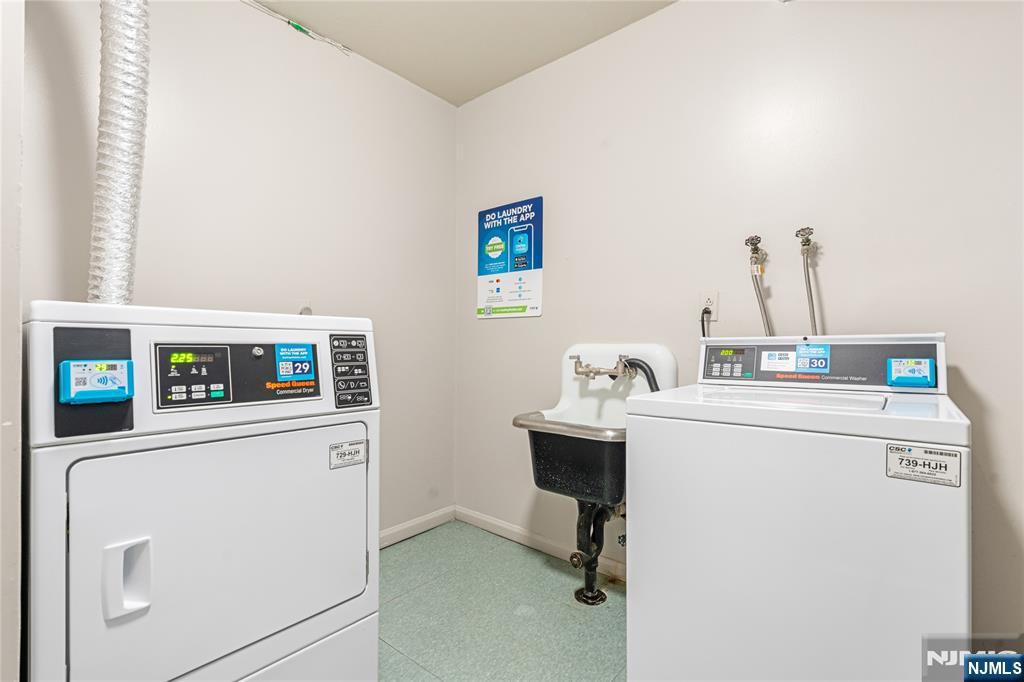 307 Prospect Avenue, Unit 17D Hackensack, NJ 07601 - Photo 20 of 29 a utility room with dryer and washer