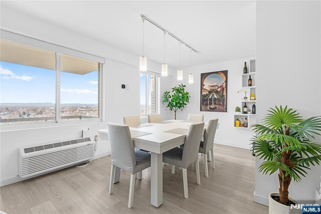 307 Prospect Avenue, Unit 17D Hackensack, NJ 07601 - Photo 3 of 29 a view of a dining room with furniture window and outdoor view