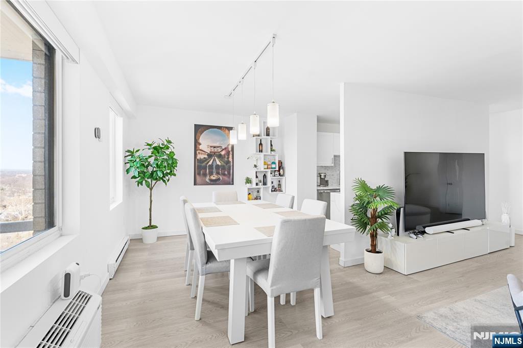307 Prospect Avenue, Unit 17D Hackensack, NJ 07601 - Photo 4 of 29 a dining room with furniture and window