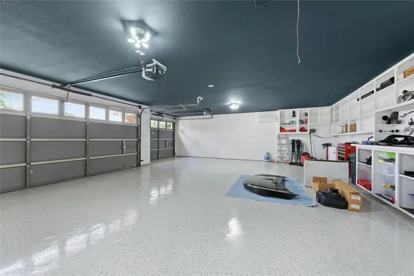 a view of a garage with storage