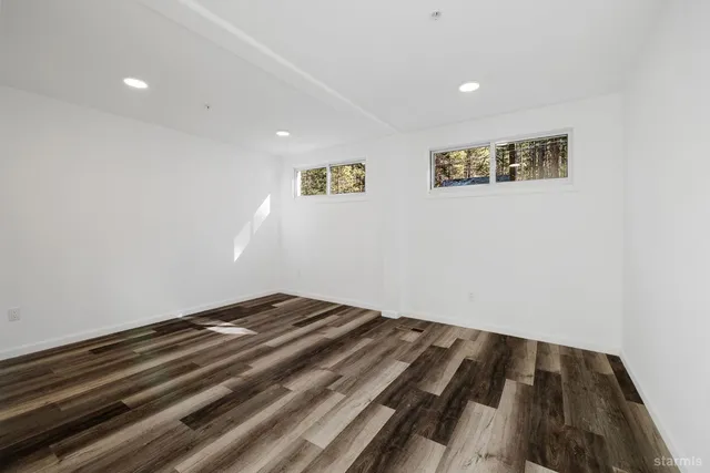 a view of a big room with wooden floor