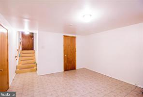 7302 Good Luck Road Hyattsville, MD 20784 - Photo 11 of 11 Spacious, versatile basement retreat.