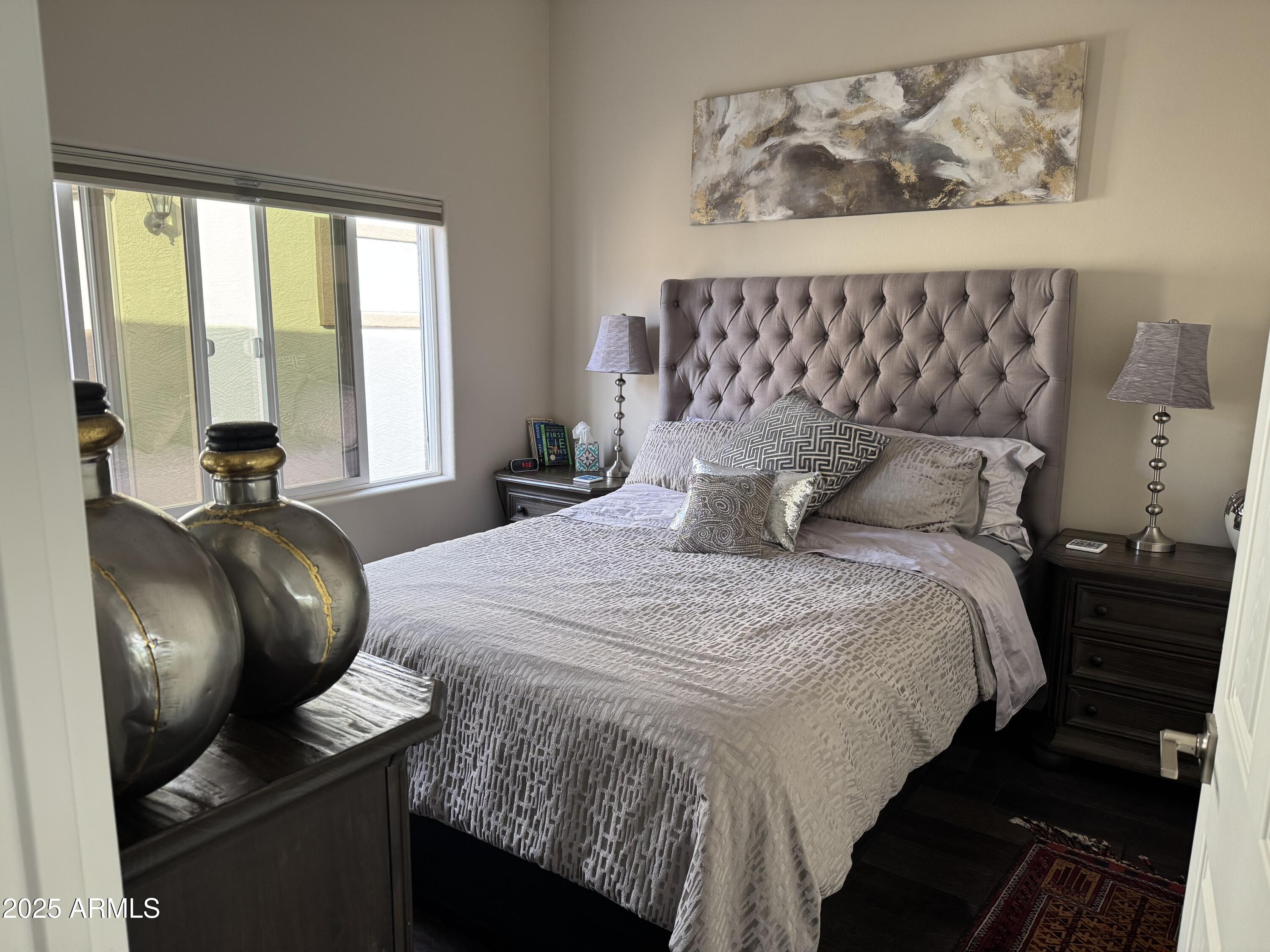 1279 South Sioux Drive Apache Junction, AZ 85119 - Photo 12 of 34 a bedroom with a bed and window