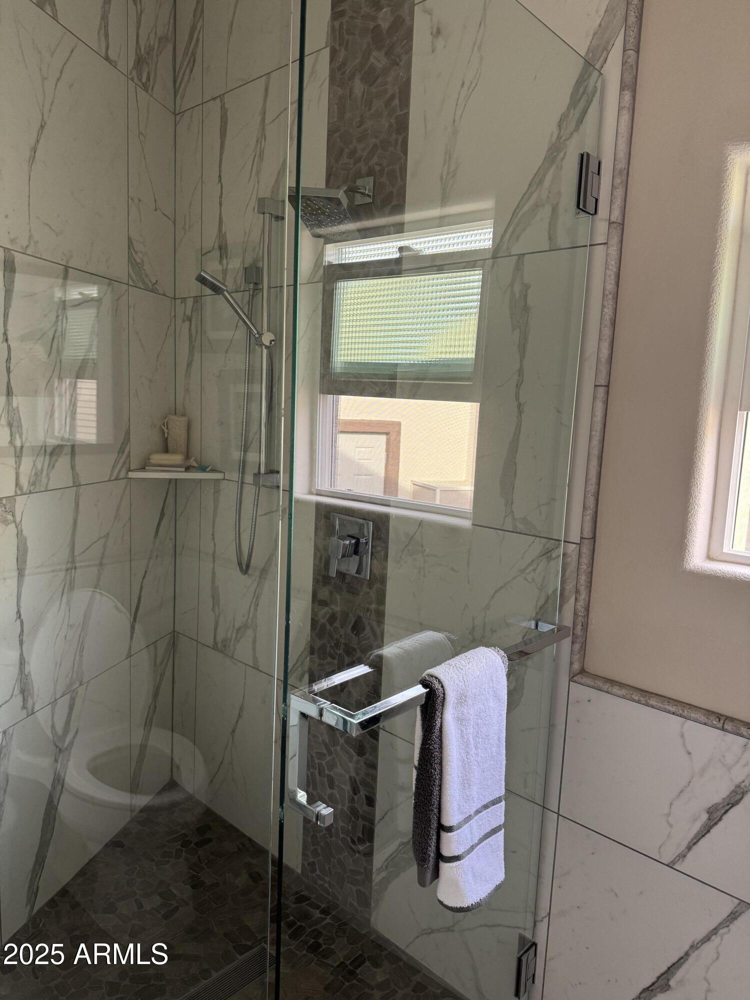 1279 South Sioux Drive Apache Junction, AZ 85119 - Photo 16 of 34 a bathroom with a sink and mirror