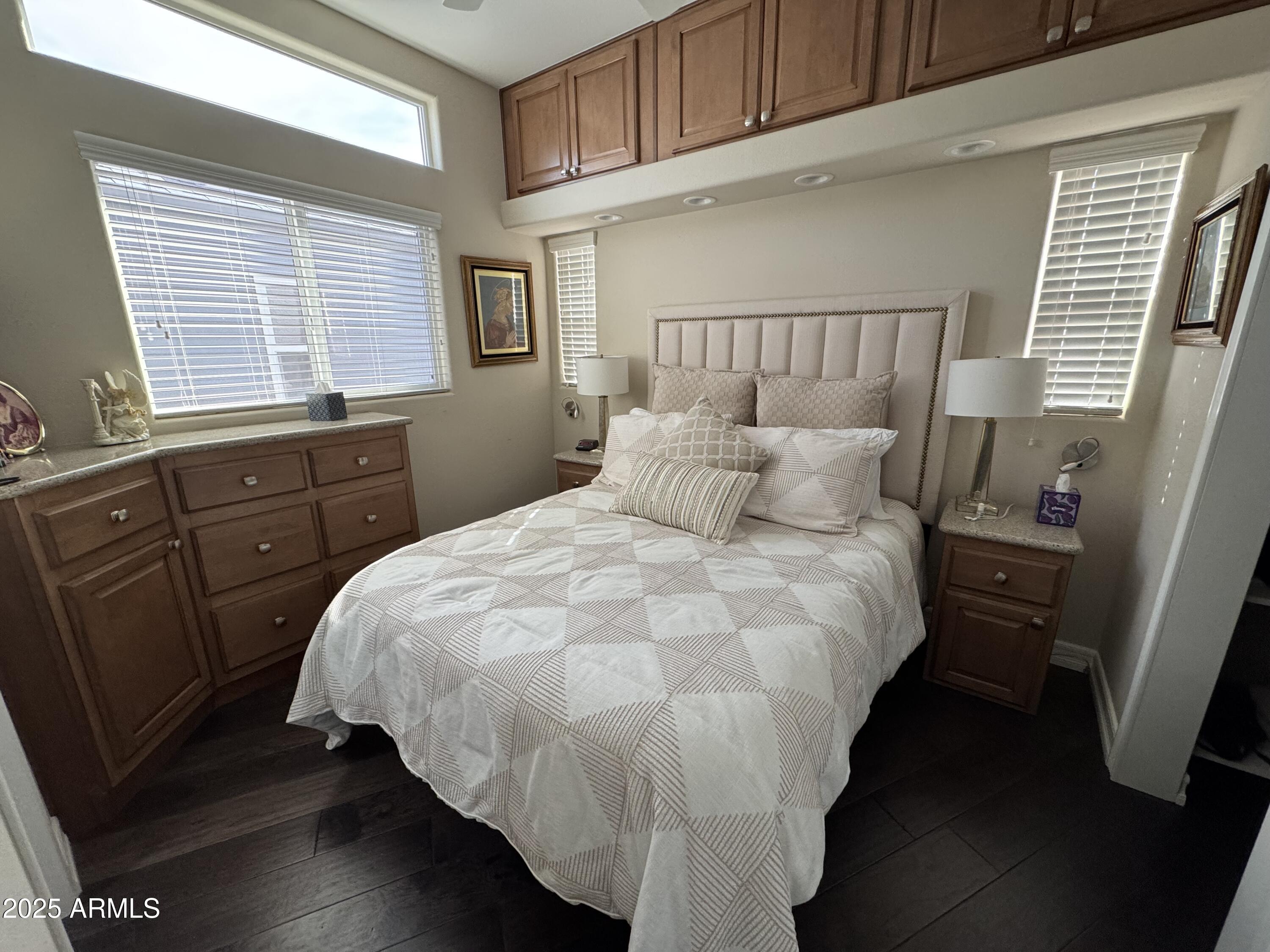 1279 South Sioux Drive Apache Junction, AZ 85119 - Photo 18 of 34 a bedroom with a bed and a window