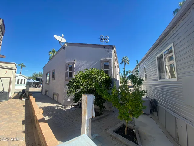 a view of a car parked in front of a house