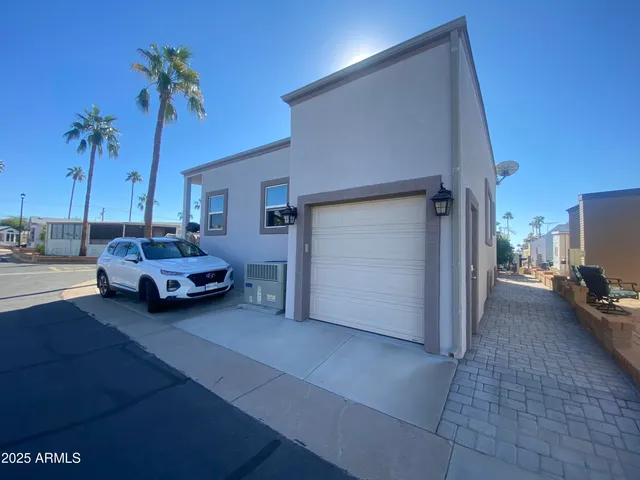 a view of a garage with parked cars