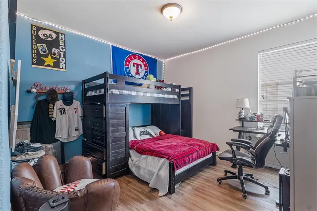 a room with furniture and wooden floor