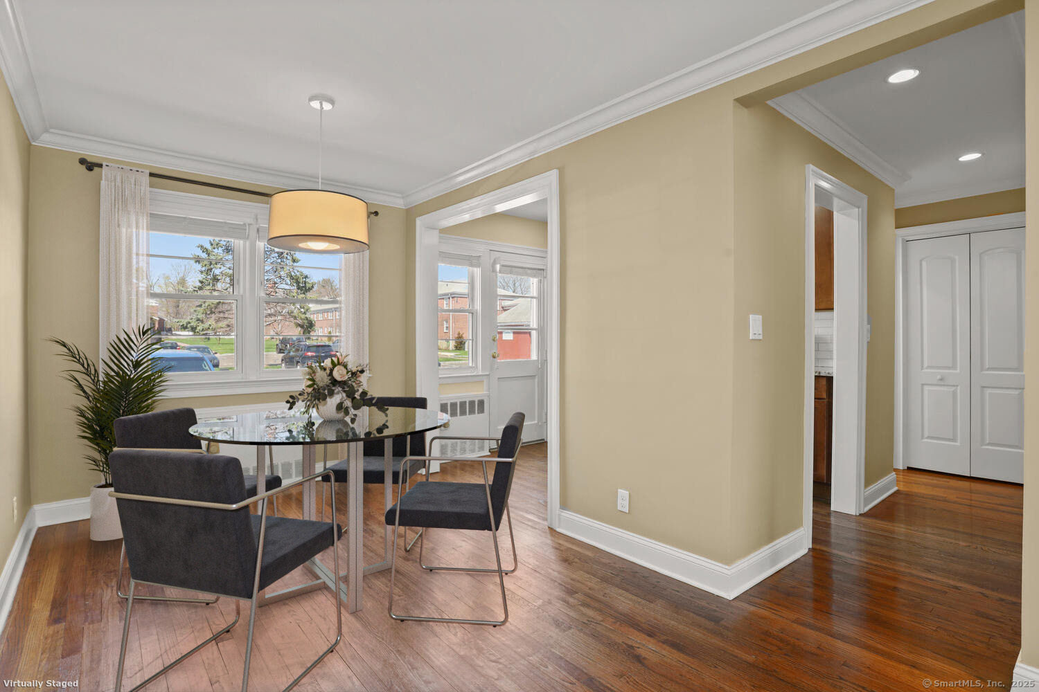 236 Glenbrook Road, Unit 13A Stamford, CT 06906 - Photo 3 of 14 a living room with furniture and wooden floor