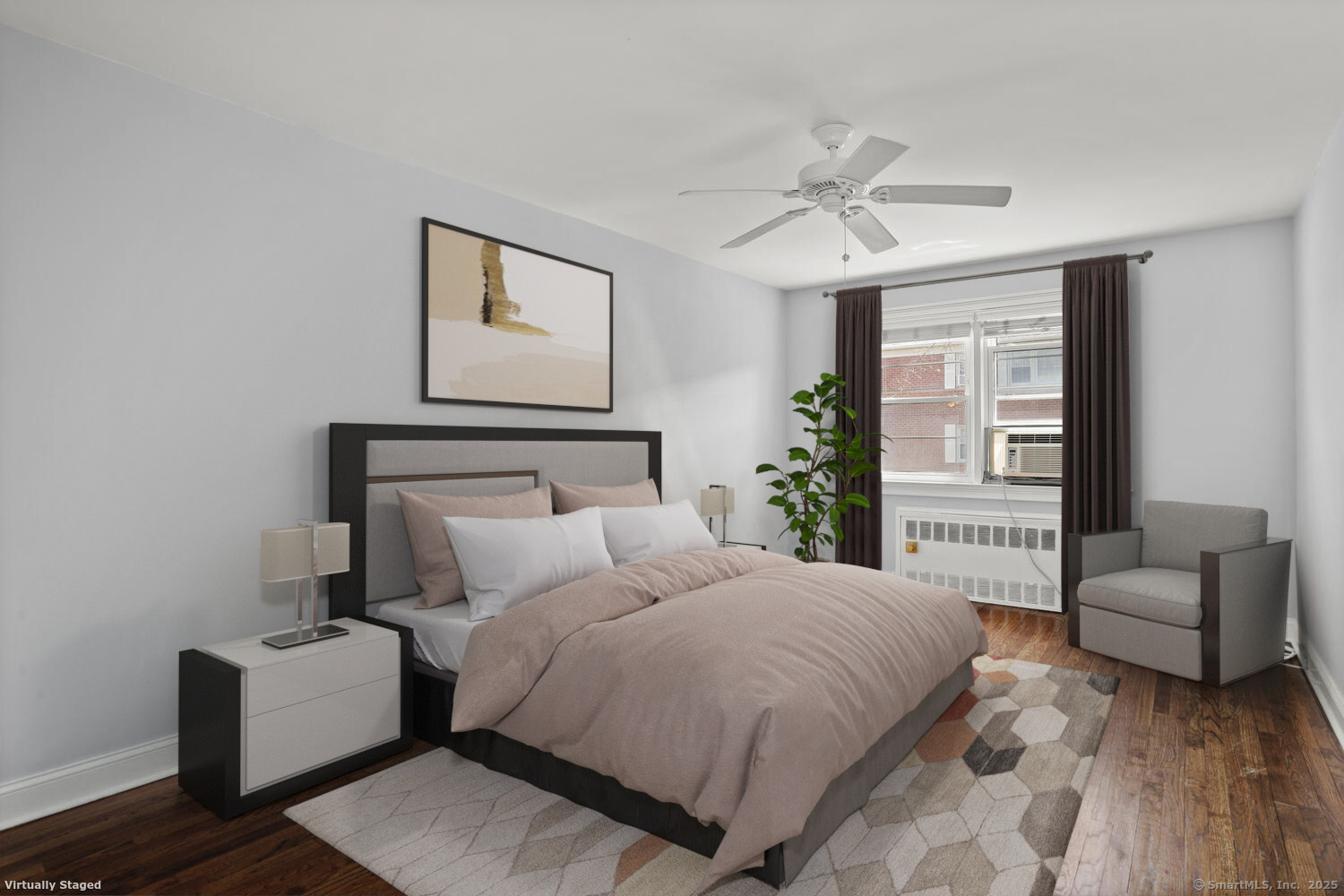 236 Glenbrook Road, Unit 13A Stamford, CT 06906 - Photo 9 of 14 a bedroom with a bed and a couch