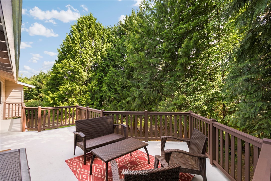 1823 175th Place Southeast Bothell, WA 98012 - Photo 23 of 24 a view of a two chairs in the deck